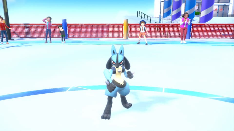 Gameplay screenshot, Lucario standing on an ice-covered Pokémon battle stadium with player character and onlookers behind them in the background.