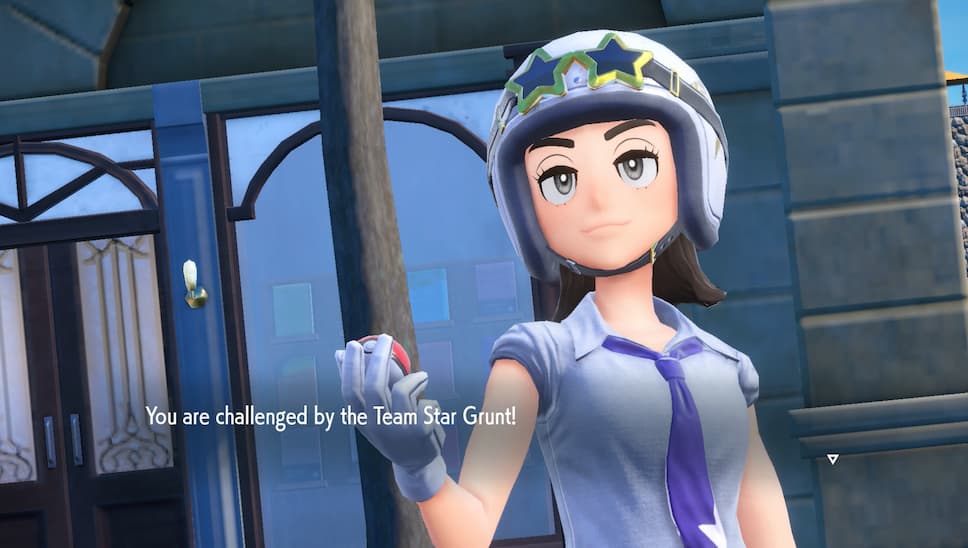 Gameplay screenshot, close-up of a Team Star grunt. Text pop-up reads "You are challenged by the Team Star Grunt!"